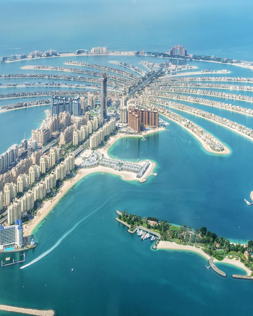 aerial-view-of-dubai-palm-jumeirah-island--united-arab-emirates-1097789900-b6c44835cb3945f481427a612f2cdd0b